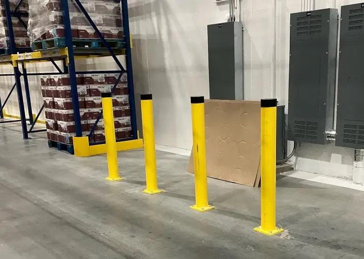 4 bolt down yellow bollards yellow bolt down warehouse bollards