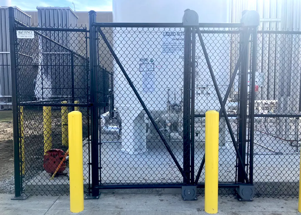 commercial chain link cantilever rolling man gate