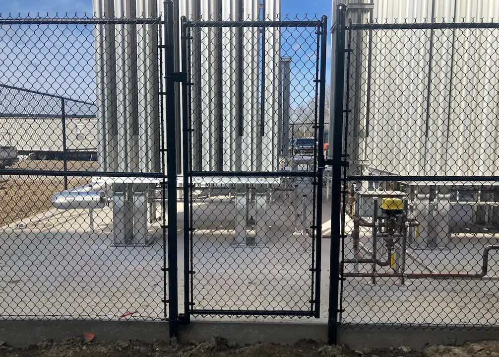 4' wide black commercial chain link fence and man gate