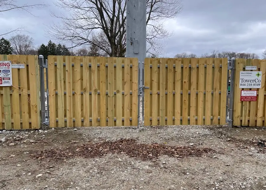 commercial steel frame wood gate steel framed shadowbox wood double gate at commercial job site