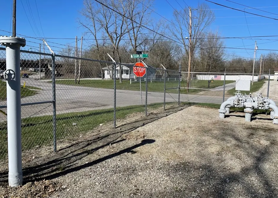 commercial chain link fence with barbed wire inside view of chain link fence with 3 strands of barbed wire on top