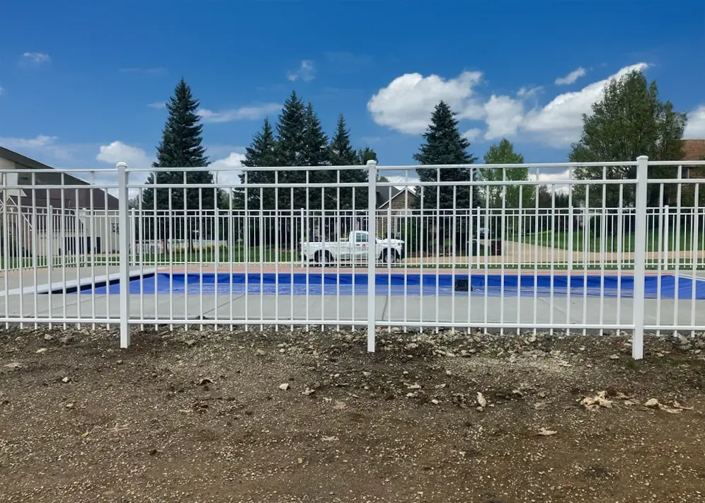 close up of flat top white aluminum fence